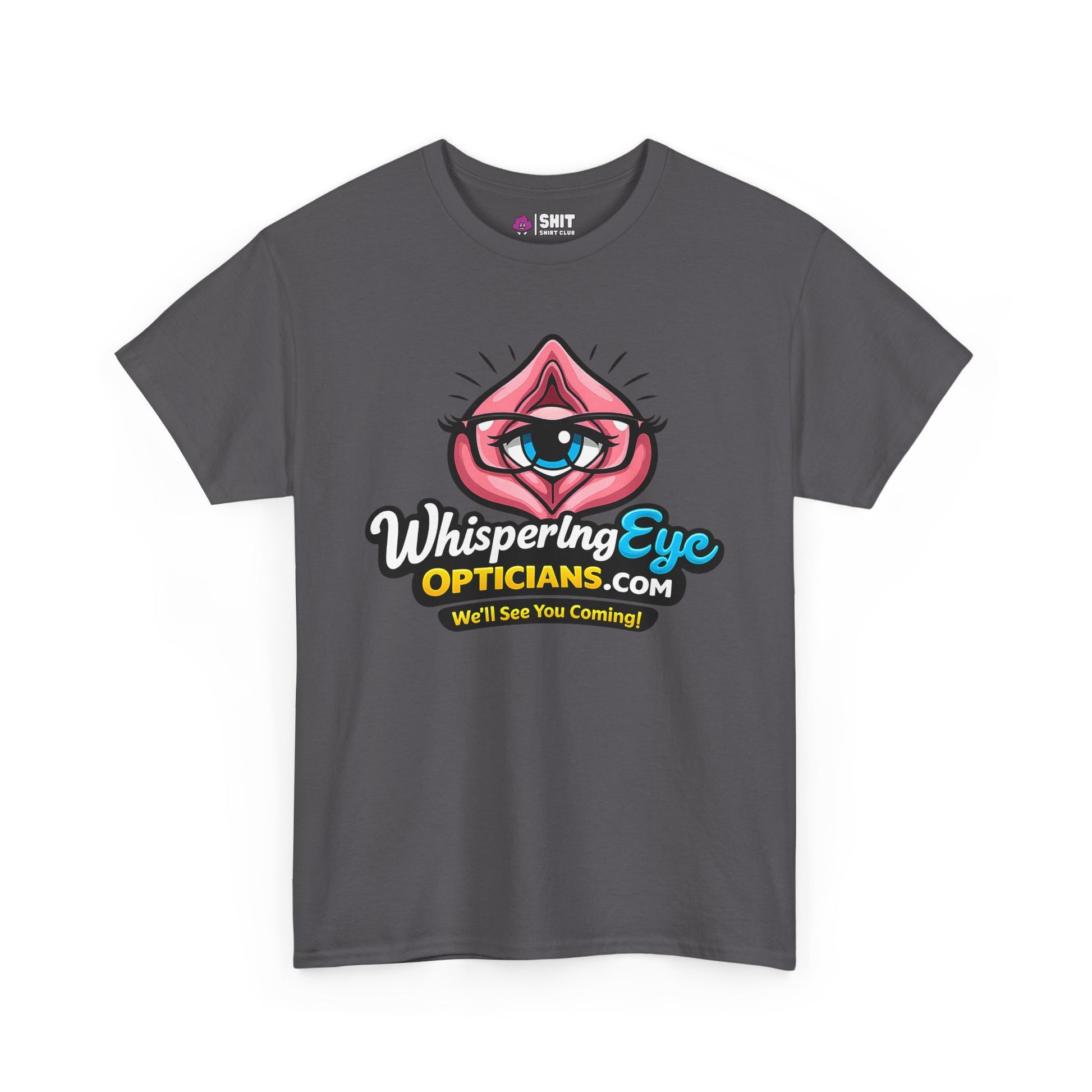 The Whispering Eye Opticians Logo Tee (We'll See You Coming!) is a dark gray top with a cartoon eye in pink lips and bold white, yellow, and blue text. Perfect rude T-shirt for a cheeky stag do or fun night out.