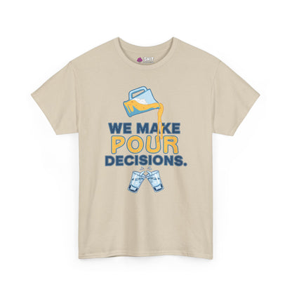The We Make Pour Decisions Stag Do Tee is a beige shirt featuring a pitcher pouring a yellow drink over “WE MAKE POUR DECISIONS” with two clinking glasses—ideal for pub crawls and stag parties.