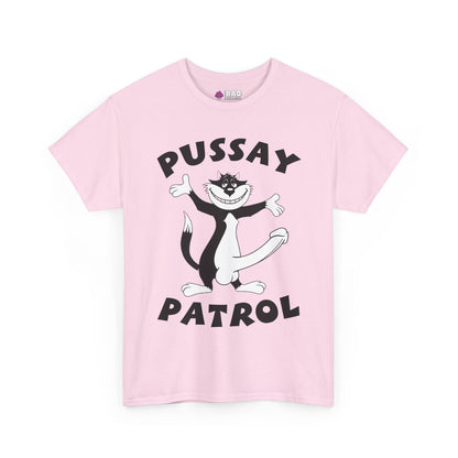 A light pink Pussay Patrol Stag Do Tee featuring a cartoon black and white cat with outstretched arms and bold "PUSSAY PATROL" lettering above and below the cat.
