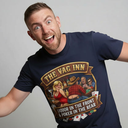 A smiling man wears The Vag Inn Stag Do Tee, a navy shirt with a cartoon of people playing cards and drinking—making it the perfect funny bachelor party shirt for any stag do.