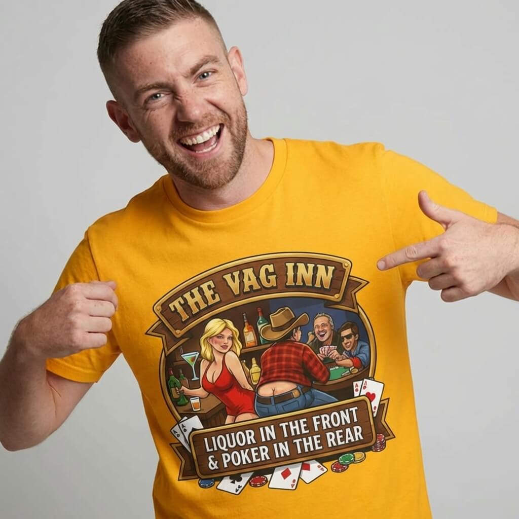 A smiling man in a yellow "The Vag Inn Stag Do Tee" points at its cartoon design—ideal for pub crawls or stag dos, featuring people playing poker with drinks and the witty slogan: THE VAG INN.