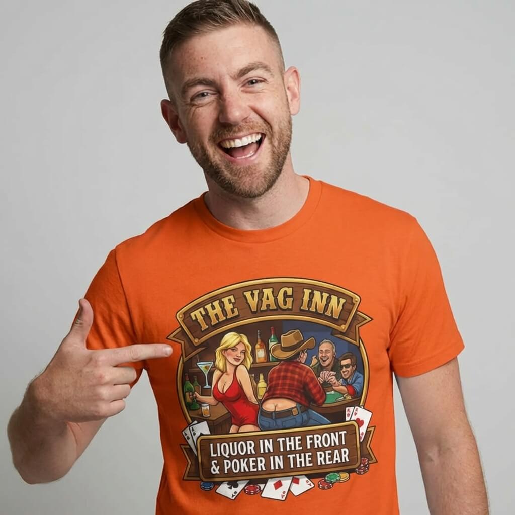 A man in the orange "The Vag Inn Stag Do Tee" points at his shirt, which features a cartoon bar scene and the text: The Vag Inn: Liquor in the Front & Poker in the Rear—a classic funny pub crawl tee.