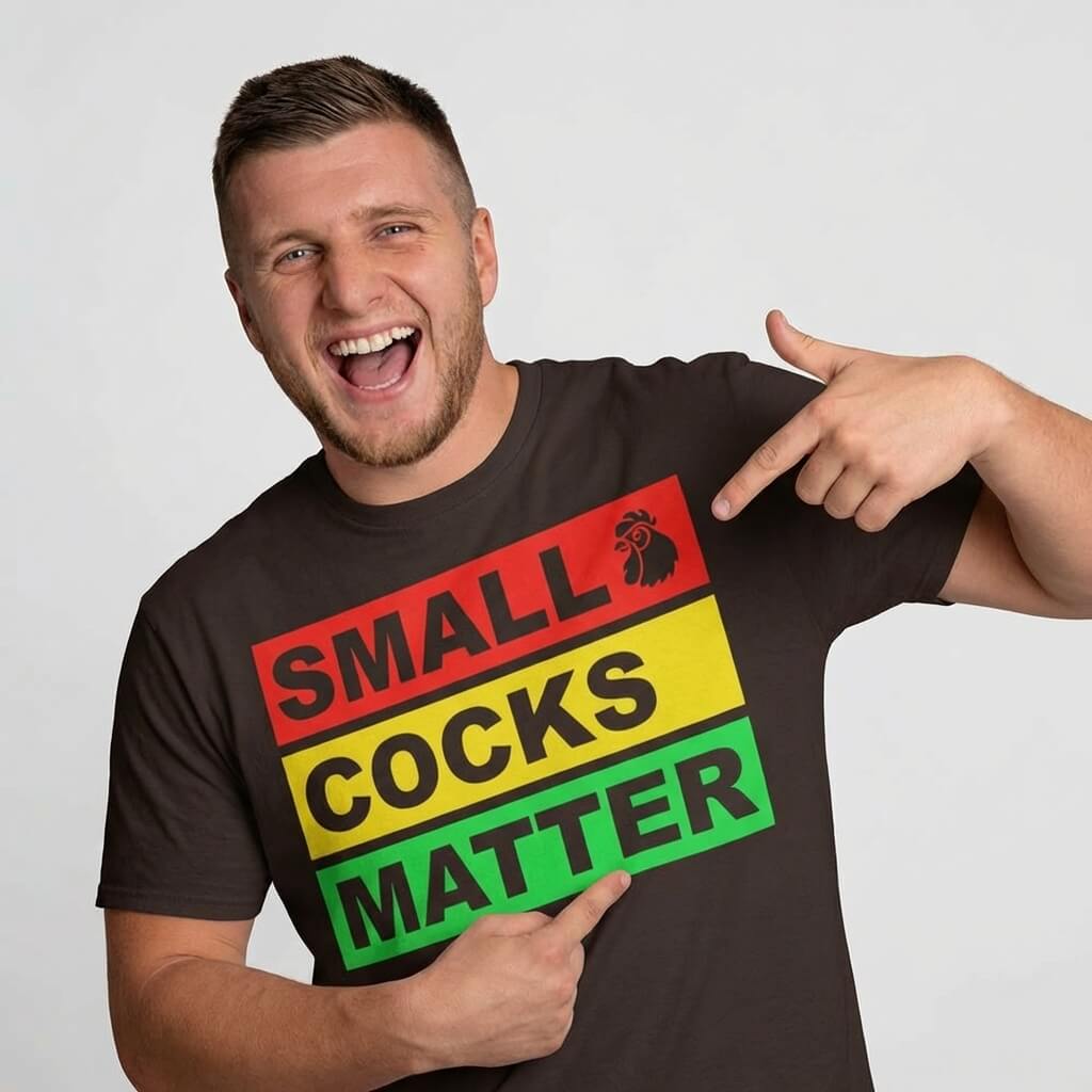 A man shows off his Small Cocks Matter Stag Do Tee, sporting bold red, yellow, and green stripes plus a rooster icon—ideal for body confidence and stag do humour.