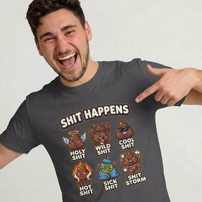 A smiling man points to his dark gray Shit Happens Stag Do Tee with cartoon poop characters and labels: holy, wild, cool, hot, sick, and storm—making it perfect for matching stag do outfits.
