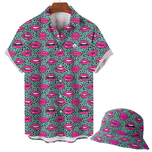 The Leopard Kiss Bad Shirt is a short-sleeve button-up featuring turquoise and black feline patterns with bold pink lips and white teeth illustrations, shown on a white background.
