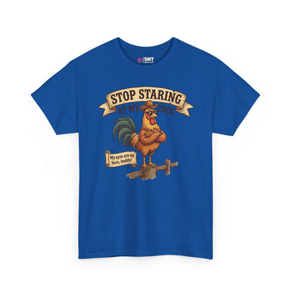 The Stop Staring at My Cock Stag Do Tee features a cartoon rooster on a fence with witty text, making it an ideal funny groom or stag party shirt for fans of lighthearted humor.