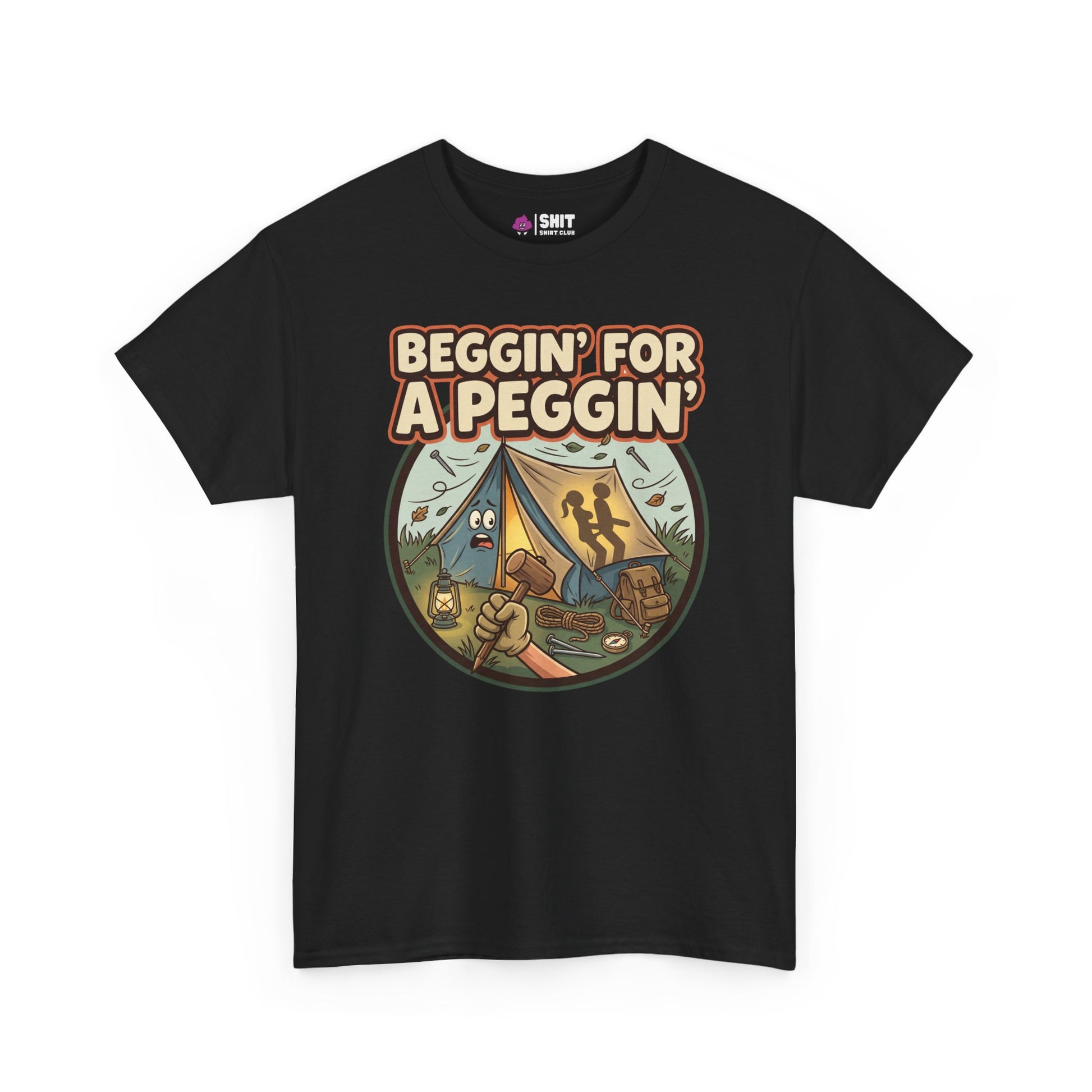 The Beggin' for a Peggin' Camping Tee features a cartoon raccoon with camping gear and bold text, making it a hilarious gift or funny festival shirt for friends who love unique, cheeky styles.