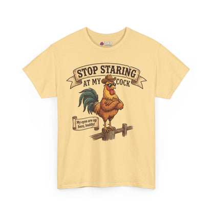 The Stop Staring at My Cock Tee is a beige t-shirt with a rooster in sunglasses, featuring the text "STOP STARING AT MY COCK" and "My eyes are up here, buddy!" Great for stag parties or as a funny groom shirt.