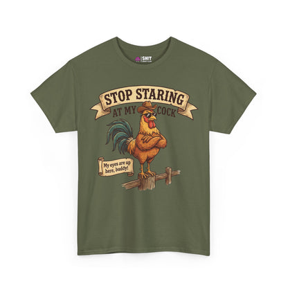 The Stop Staring at My Cock Tee is an olive green shirt with a cartoon rooster in sunglasses on a fence and playful text above and below—perfect as a funny groom or stag party t-shirt.