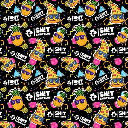 The “Wanna Pizza This Bucket Hat” features a vibrant, repeating pattern of pineapples with sunglasses, pizza slices in bucket hats, tropical drinks, geometric shapes, and “SH!T SHIRT CLUB” logos on a black background.