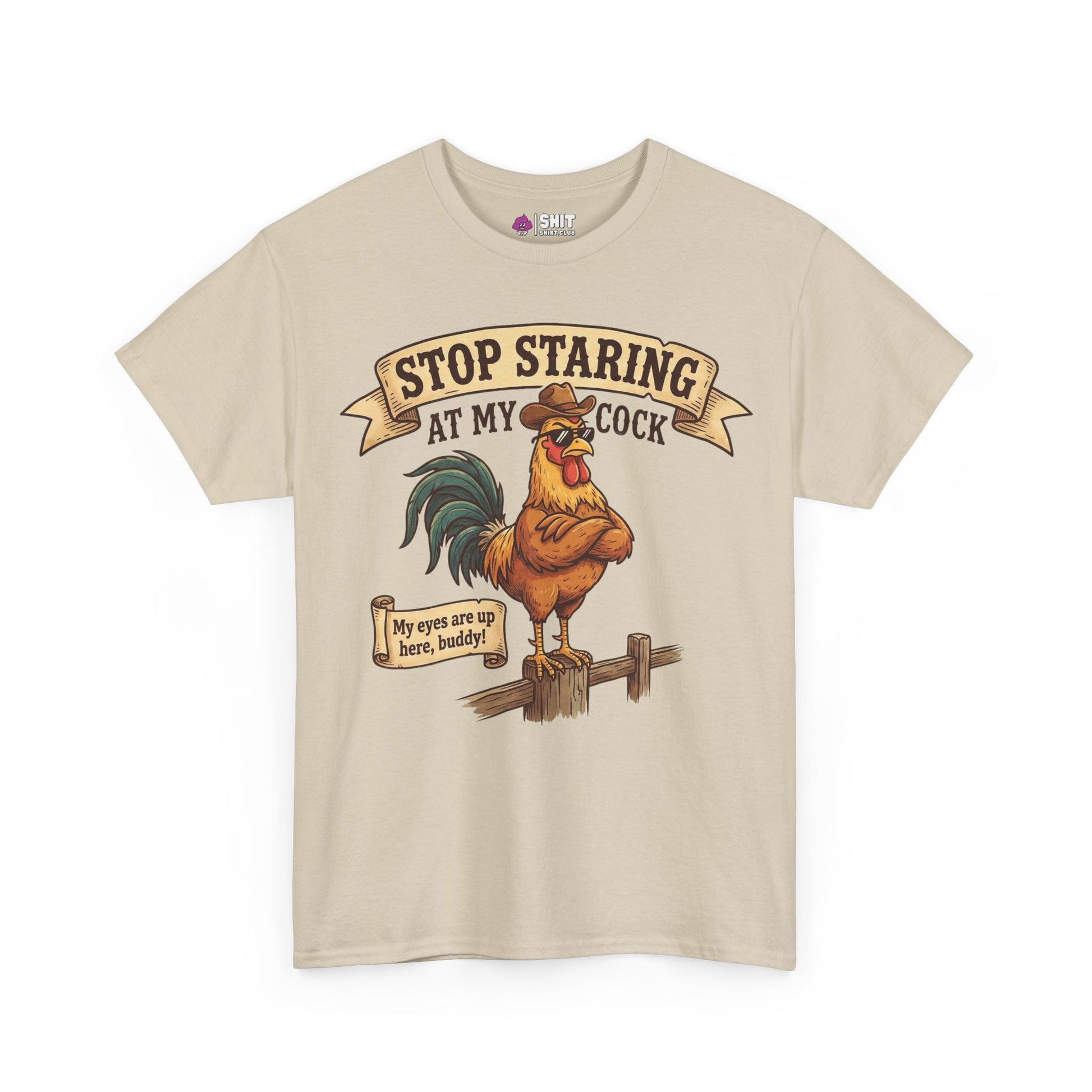 The Stop Staring at My Cock Tee is a beige funny rooster t-shirt with an illustrated rooster in sunglasses and cheeky text, perfect for stag parties. Features a sign: "My eyes are up here, buddy!.