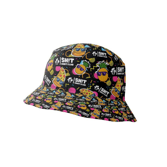 The Wanna Pizza This Bucket Hat is a colorful hat featuring cartoon pineapples, pizza slices, and sunglasses with SH!T Shirt Club text on a black background.