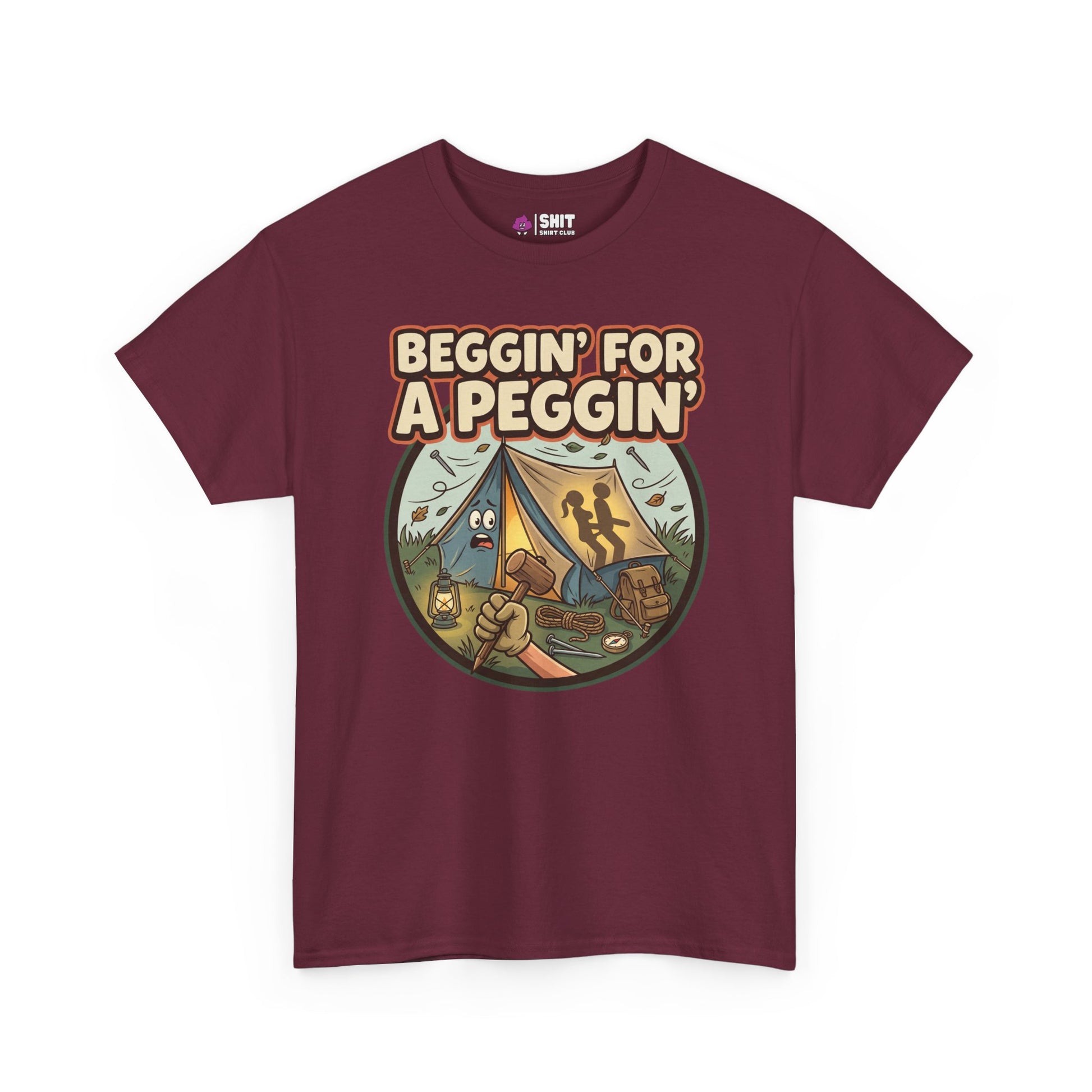 The Beggin' for a Peggin' Camping Tee is a maroon shirt with camping gear, a tent, and two people cartoon under bold "BEGGIN FOR A PEGGIN" text—ideal as a cheeky gift or playful festival outfit.