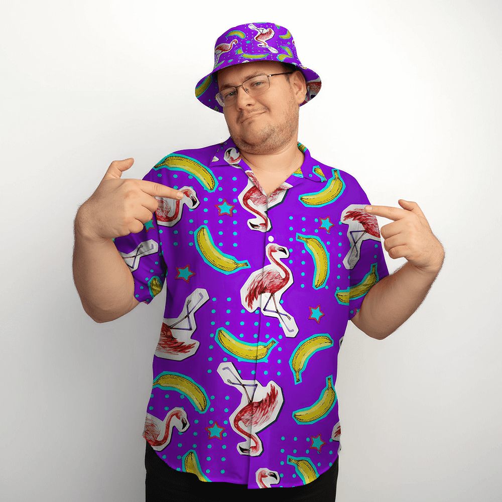 Man wearing the Bananas for Flamingos Shirt and matching Bananas for Flamingos Bucket Hat, pointing at themselves
