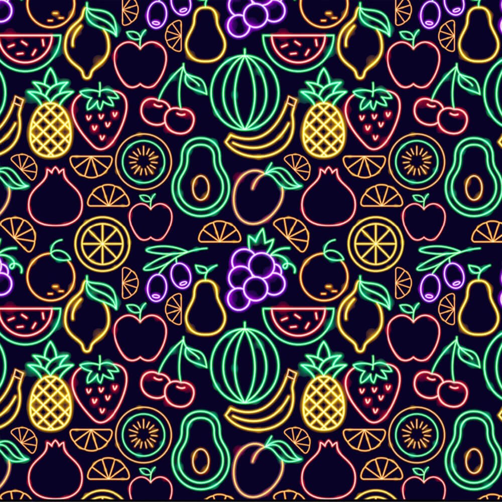 The Fluorescent Fruit Fiesta Shirt features a seamless pattern of neon fruit outlines—watermelon, banana, pineapple, cherries, and more—on a dark background for a vibrant party look.