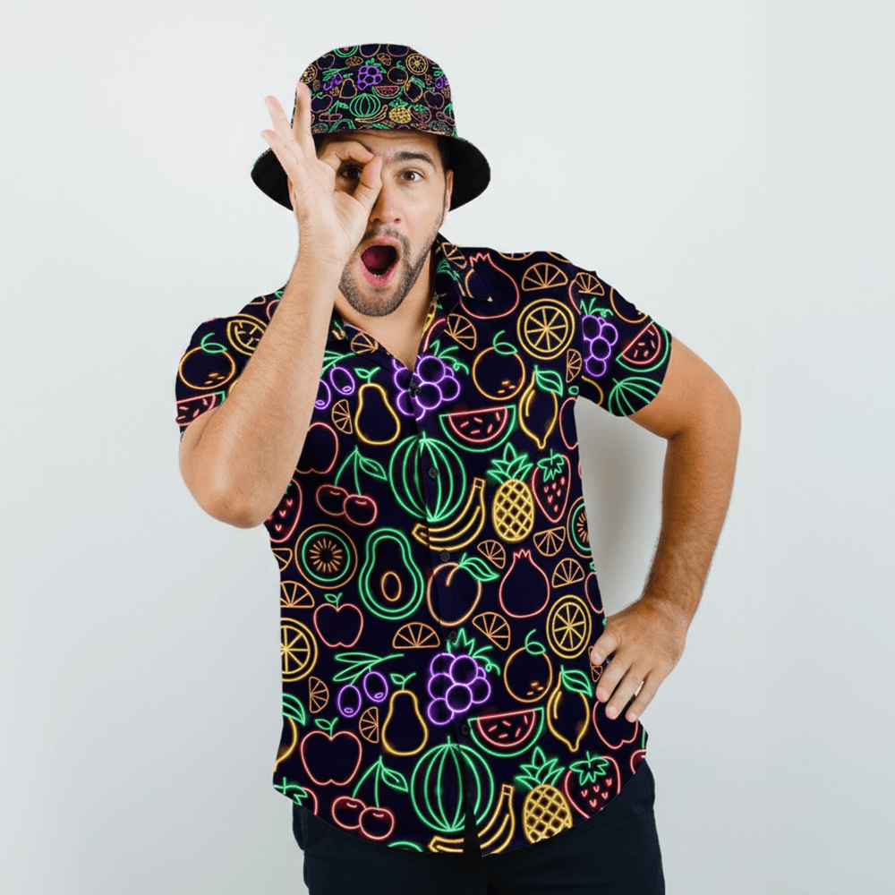 Man wearing the Fluorescent Fruit Shirt and matching Fluorescent Fruit Bucket Hat on a white background
