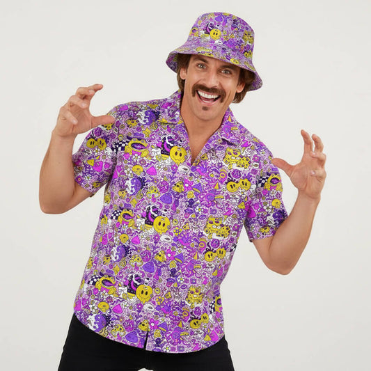 A man with a mustache wears the Magical Psychedelic Shirt and a vibrant purple bucket hat, both featuring cartoon and smiley face patterns, playfully raising his hands like a monster against a plain white background.