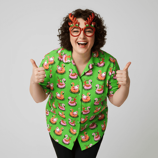 Woman wearing the Pool Party Xmas Shirt and reindeer antler glasses doing thumbs up on a plain background