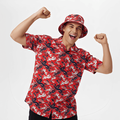 Person wearing the Red England FC Hawaiian Shirt and matching bucket hat on a white background