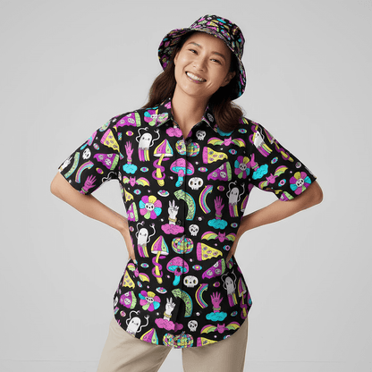 Woman wearing the Shroom Shirt and matching Shroom Bucket Hat on a grey background