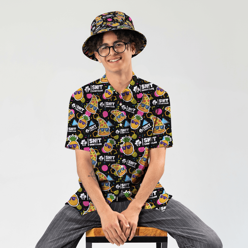 Person wearing the Wanna Pizza This Shirt and matching Wanna Pizza This Bucket Hat sitting on a stool 