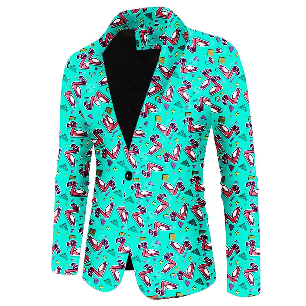 The Flamingo Fandango Blazer features playful pink flamingos, sunglasses, and vibrant shapes on turquoise, with a black inner lining and single button closure—a bold, fun statement jacket.